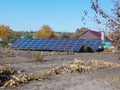 solar panels on the field near the house