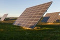 Solar Panels in the Field at sunset Royalty Free Stock Photo