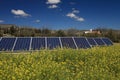 Solar panels on a flower meadow Royalty Free Stock Photo