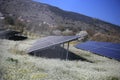 solar panels on the flowers of spring meadow blue sky Royalty Free Stock Photo