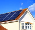 Solar panels on house roof top stock photo Royalty Free Stock Photo