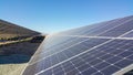 Solar panels installed on the ground, sunlight falls on it, environmentally friendly renewable energy, cheap and modern way to gen Royalty Free Stock Photo