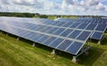 Solar panels installed on a house roof, harnessing renewable energy from sunlight to power households Royalty Free Stock Photo