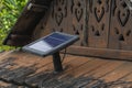 Solar panels are mounted on a old wooden sheet roof Royalty Free Stock Photo