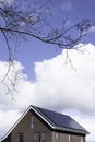 Solar panels mounted on the roof of a modern new-build house in the Netherlands Royalty Free Stock Photo