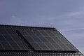 Solar panels mounted on the tile roof of a modern new-build house in the Netherlands Royalty Free Stock Photo