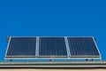 Solar panels or photovoltaic or solar thermal plant on the roof of a house Royalty Free Stock Photo