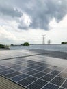 Solar panels of photovoltaic power station or solar park for the supply of electricity on a roof of factory Royalty Free Stock Photo