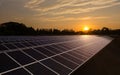 Solar panels with warm sunrise sky