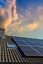 Solar panels producing clean energy on a roof of a residential house