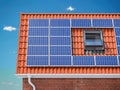 Solar panels for on the red tiled roof of suburban house, Photovoltaic module and regenerative energy system Royalty Free Stock Photo