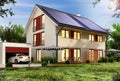 Solar panels on the roof of a modern house with a garage and a car Royalty Free Stock Photo