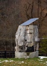 Rustic bath house with solar sun panel Royalty Free Stock Photo