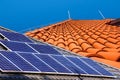 Solar panels and roofs of different houses