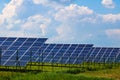 Solar panels with the sunny sky. Blue solar panels, background of photovoltaic modules for renewable energy