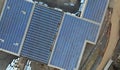 Solar panels system in the commercial building on roof of urban clean ecological energy renewable Royalty Free Stock Photo