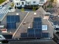 Solar panels system on the house roof in the city. Technology for alternative energy concept Royalty Free Stock Photo