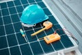 Solar panels, tools and helmet, maintenance and clean energy with natural power supply and electricity. Sustainability Royalty Free Stock Photo