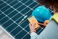Solar panels, tools and maintenance, person and inspection with, clean energy and natural power supply for electricity Royalty Free Stock Photo