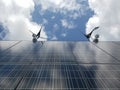 Solar panels, turbines, cameras, clouds