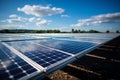 Solar panels under blue sky with white clouds. Solar energy producing with photovoltaic cells Royalty Free Stock Photo