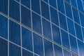 Solar panels on the wall of a multi-storey building. Renewable solar energy Royalty Free Stock Photo