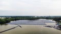 Solar panels on water in aerial view