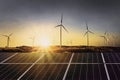 solar panels with wind turbine and sunset .concept power energy Royalty Free Stock Photo