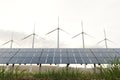 solar panels, windmill, in nature generate electricity from air and Royalty Free Stock Photo