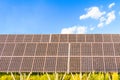 Solar power panels ,Photovoltaic modules for innovation green energy for life with blue sky background. Royalty Free Stock Photo