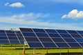 Solar power plant - concept for electricity and ecological industry. High energy prices. Beautiful landscape and sunny day with Royalty Free Stock Photo