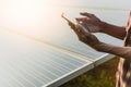 solar power plant Engineer surveying a solar farm