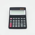 A solar-powered calculator with a black body and a rectangular display screen. It Royalty Free Stock Photo