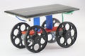 Solar powered car which is an educational toy that teaches concepts of energy conversions. 3D printed wheels for solar car