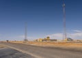 Solar powered communication towers and a checkpoint along a highway in Egypt.