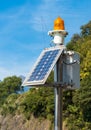 Solar powered lighthouse in the harbour Royalty Free Stock Photo