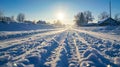 The solar-powered snow melting system glistens under the bright sun's rays on a snowy road. Royalty Free Stock Photo