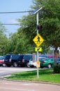 Solar powered street crosswalk sign Royalty Free Stock Photo