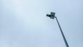 Solar-powered street lamp with a white background. Royalty Free Stock Photo