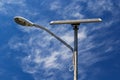 Solar powered street light with blue sky and clouds Royalty Free Stock Photo