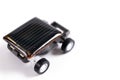 Solar powered toy car using small cells isolated on white background Royalty Free Stock Photo