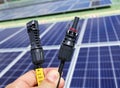 Solar PV Connectors Male and Female Hand Holding Royalty Free Stock Photo