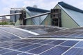 Solar PV on Factory Roof with Triangle Warehouse Background