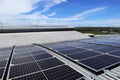 Solar PV Rooftop on Curve Roof under Construction Blue Sky Background Royalty Free Stock Photo