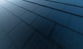 Solar roof concept. Building-integrated photovoltaics system consisting of modern monocrystal black solar roof tiles. Royalty Free Stock Photo