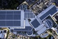 Solar roof, Solar on the roof, top view worker installing a solar cell on the factory roof