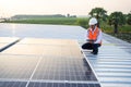 The solar rooftop(solar panel) with engineers check the operation of the system. Royalty Free Stock Photo