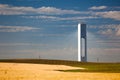 Solar Tower with rays - thermo-solar power - blue sky and yello