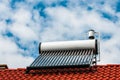 Solar water heater boiler on residentual house rooftop Royalty Free Stock Photo