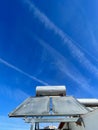 Solar water heater installed on tile roof of house for environmentally Royalty Free Stock Photo